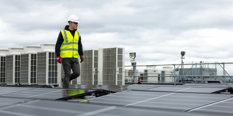 Height Worker wearing safety helmet and hi-visibility gear