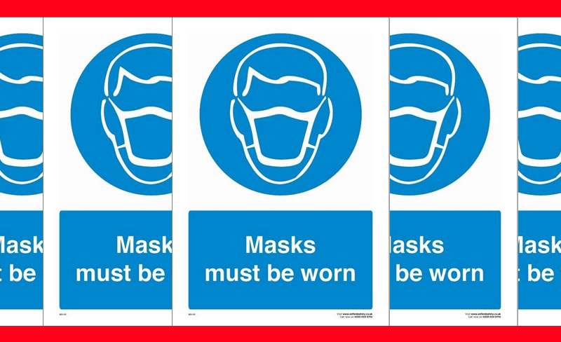 Blue and white icon of a male wearing a mask with wording displayed - masks must be worn.