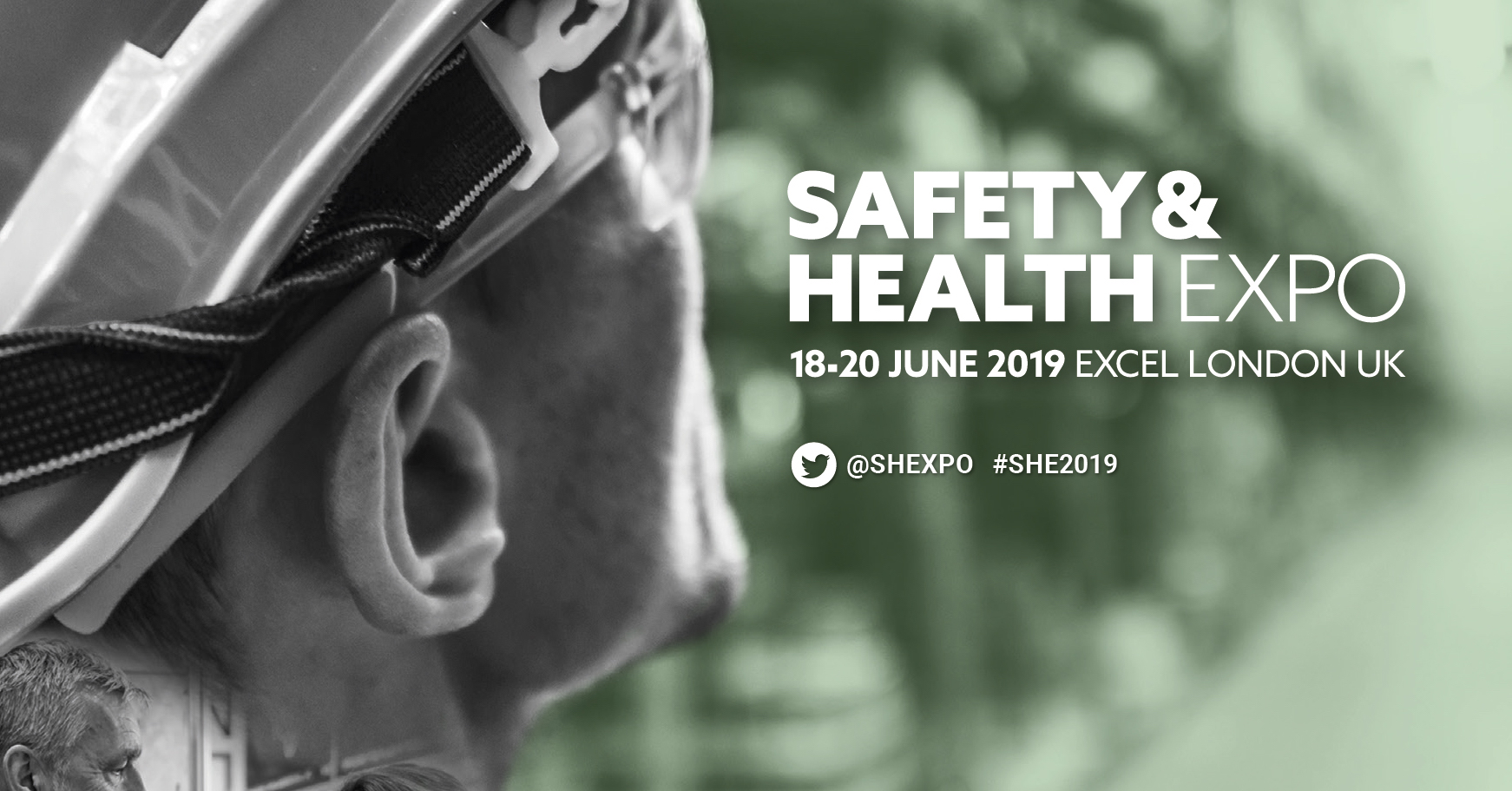 Construction site worker in safety gear looking at words: Safety & Health Expo 2019